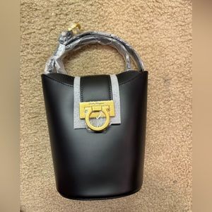 Elegant Black Ferragamo w gold gancini buckles great for evening wear